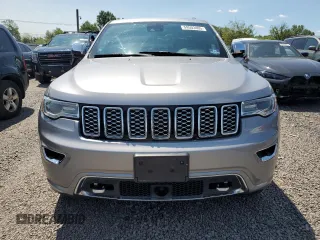 2018 Jeep Grand Cherokee Overland with VIN 1C4RJFCG2JC212947, listed as a Copart auction lot 59503405 with 76,436 mi miles and Clean title. Bid and sale history available at DreamBid. Image 5.