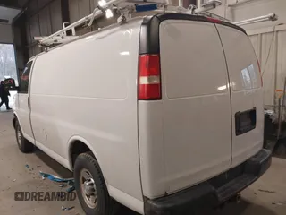 2015 Chevrolet Express Cargo Van with VIN 1GCWGFCF9F1167677, listed as a IAAI auction lot 42018087 with 148,263 mi miles. Bid and sale history available at carsss.com. Image 3.