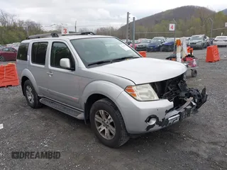 2012 Nissan Pathfinder SV z VIN 5N1AR1NB8CC640742, wystawiony jako IAAI lot #42010014 z przebiegiem 301 996 mil mil oraz . Historia ofert i sprzedaży dostępna na DreamBid. Obrazek 1.