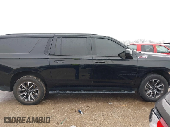 2022 Chevrolet Suburban Z71 with VIN 1GNSKDKD3NR251387, listed as a IAAI auction lot 41566234 with 154,014 mi miles. Bid and sale history available at carsss.com. Image 13.
