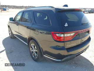 2016 Dodge Durango Limited with VIN 1C4RDHDG9GC360118, listed as a IAAI auction lot 41696388 with 217,550 mi miles. Bid and sale history available at carsss.com. Image 3.