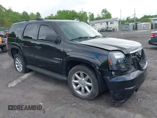 2007 GMC Yukon SLT z VIN 1GKFK13057R336128, wystawiony jako IAAI lot #42301778 z przebiegiem 153 227 mil mil oraz . Historia ofert i sprzedaży dostępna na DreamBid. Obrazek 1.