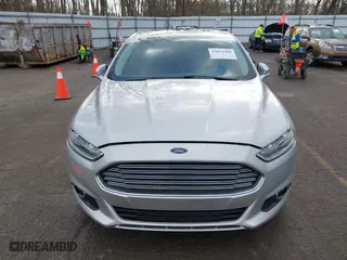 2015 Ford Fusion Titanium Hybrid with VIN 3FA6P0RU8FR181312, listed as a IAAI auction lot 42071584 with 99,955 mi miles. Bid and sale history available at carsss.com. Image 12.