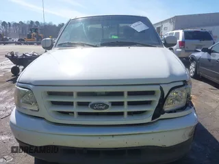 2002 Ford F-150 XL with VIN 1FTRX17L32NA13159, listed as a IAAI auction lot 41653814 with 435,395 mi miles. Bid and sale history available at carsss.com. Image 12.
