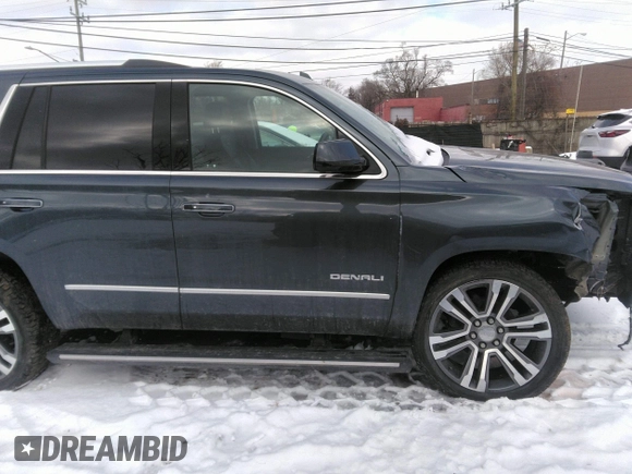 2020 GMC Yukon Denali with VIN 1GKS2CKJ6LR138351, listed as a IAAI auction lot 41316462 with 107,489 mi miles. Bid and sale history available at carsss.com. Image 13.