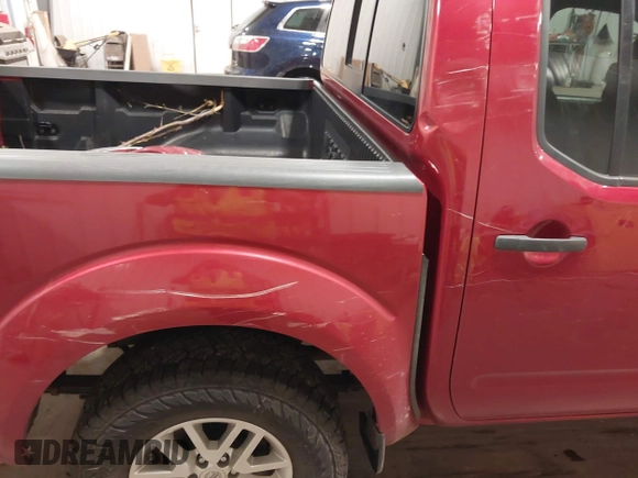 2014 Nissan Frontier S with VIN 1N6AD0EV6EN708600, listed as a IAAI auction lot 42296112 with 112,737 mi miles and . Bid and sale history available at DreamBid. Image 19.