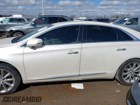 2014 Cadillac XTS Premium with VIN 2G61P5S38E9124277, listed as a IAAI auction lot 41744734 with 136,223 mi miles. Bid and sale history available at carsss.com. Image 14.