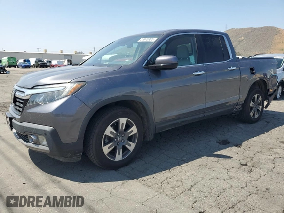 2019 Honda Ridgeline RTL-E with VIN 5FPYK3F73KB016675, listed as a Copart auction lot 55340905 with 69,571 mi miles and Salvage title. Bid and sale history available at DreamBid. Image 1.