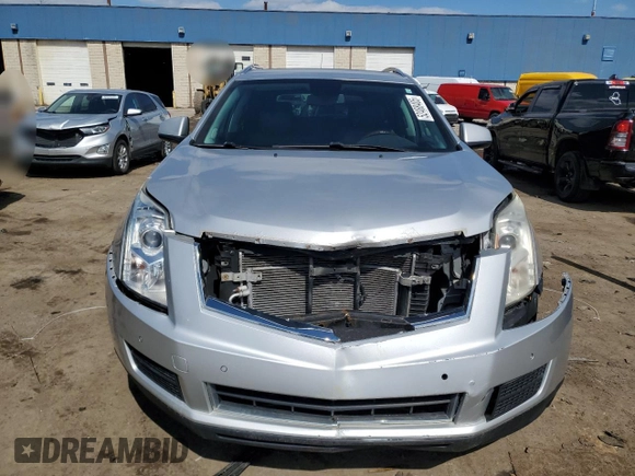 2012 Cadillac SRX Luxury Collection z VIN 3GYFNAE39CS502422, wystawiony jako Copart lot #52488405 z przebiegiem 109 001 mil mil oraz Czysty tytuł • Clean title. Historia ofert i sprzedaży dostępna na DreamBid. Obrazek 5.