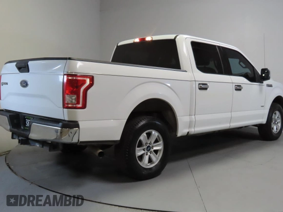 2015 Ford F-150 XL with VIN 1FTEW1CG0FKD61342, listed as a Copart auction lot 60142545 with 113,798 mi miles and Salvage title. Bid and sale history available at DreamBid. Image 3.