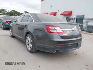 2015 Ford Taurus SEL with VIN 1FAHP2E8XFG161616, listed as a IAAI auction lot 42049199 with 138,565 mi miles and . Bid and sale history available at carsss.com. Image 3.