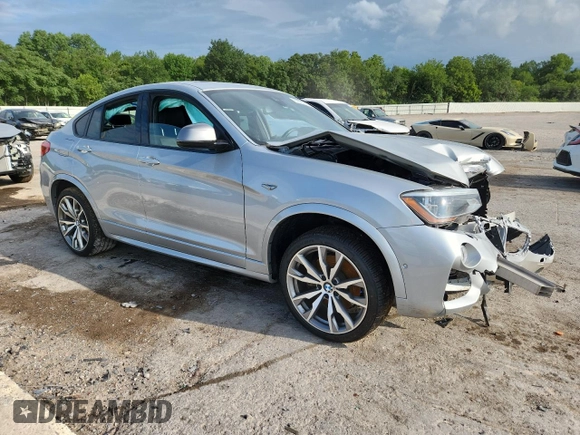 2017 BMW X4 M40i with VIN 5UXXW7C36H0U26510, listed as a Copart auction lot 62700515 with Not provided miles and Salvage title. Bid and sale history available at DreamBid. Image 4.