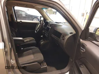 2014 Jeep Patriot Sport with VIN 1C4NJPBB2ED758884, listed as a IAAI auction lot 41290599 with 136,655 mi miles and . Bid and sale history available at DreamBid. Image 5.