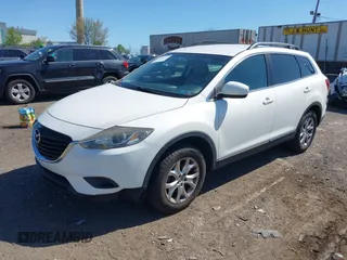 2015 Mazda CX-9 Touring with VIN JM3TB3CV1F0461403, listed as a IAAI auction lot 42148325 with 143,452 mi miles. Bid and sale history available at carsss.com. Image 2.