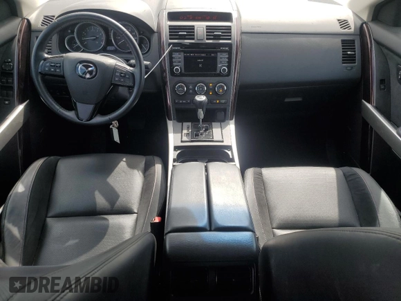 2015 Mazda CX-9 Grand Touring z VIN JM3TB3DA6F0460842, wystawiony jako Copart lot #52630325 z przebiegiem 21 666 mil mil oraz Szkoda całkowita • Salvage title. Historia ofert i sprzedaży dostępna na DreamBid. Obrazek 8.