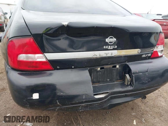 2000 Nissan Altima XE with VIN 1N4DL01D9YC104061, listed as a IAAI auction lot 41970227 with 176,515 mi miles and . Bid and sale history available at DreamBid. Image 6.