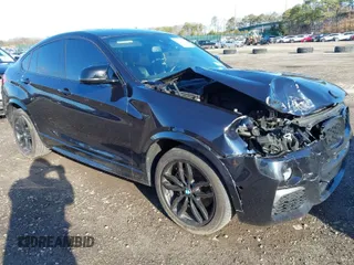 2018 BMW X4 M40i z VIN 5UXXW7C59J0Z44795, wystawiony jako IAAI lot #41837764 z przebiegiem 81 990 mil mil oraz . Historia ofert i sprzedaży dostępna na DreamBid. Obrazek 1.