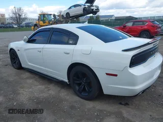 2012 Dodge Charger Police with VIN 2C3CDXAT0CH199106, listed as a IAAI auction lot 42020577 with 156,248 mi miles. Bid and sale history available at carsss.com. Image 3.