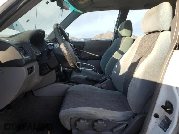 1999 Subaru Forester L with VIN JF1SF635XXH741226, listed as a Copart auction lot 86736214 with 287,417 mi miles and Salvage Title. Bid and sale history available at carsss.com. Image 7.