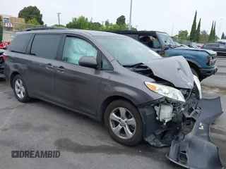 2015 Toyota Sienna LE AAS with VIN 5TDKK3DC5FS606862, listed as a IAAI auction lot 42464119 with 158,135 mi miles and . Bid and sale history available at DreamBid. Image 1.