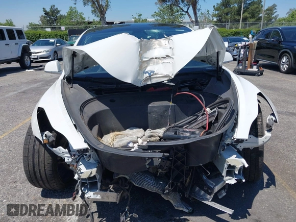 2020 Tesla Model 3 Performance z VIN 5YJ3E1EC6LF805448, wystawiony jako IAAI lot #42207433 z przebiegiem 114 412 mil mil oraz . Historia ofert i sprzedaży dostępna na DreamBid. Obrazek 6.