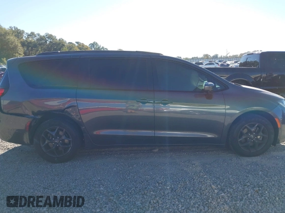 2020 Chrysler Pacifica Touring with VIN 2C4RC1FG1LR245764, listed as a IAAI auction lot 40646472 with 86,119 mi miles and . Bid and sale history available at DreamBid. Image 13.