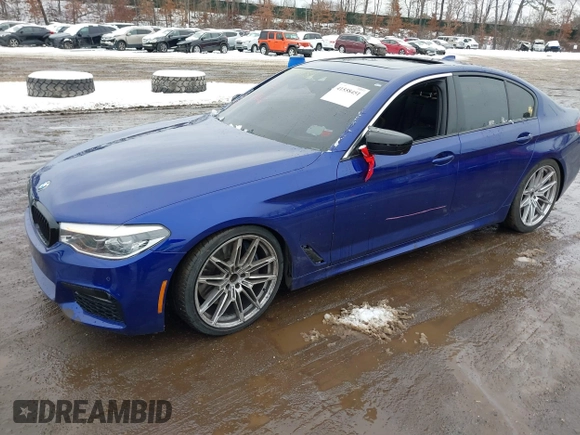 2018 BMW 5 Series 540i xDrive with VIN WBAJE7C5XJWC56733, listed as a IAAI auction lot 41558451 with 67,460 mi miles and . Bid and sale history available at DreamBid. Image 2.