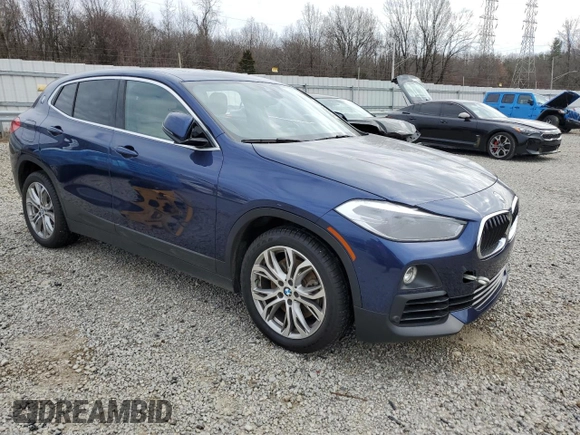 2018 BMW X2 sDrive28i with VIN WBXYJ3C35JEJ89968, listed as a Copart auction lot 87488354 with 68,945 mi miles and Salvage title. Bid and sale history available at DreamBid. Image 4.