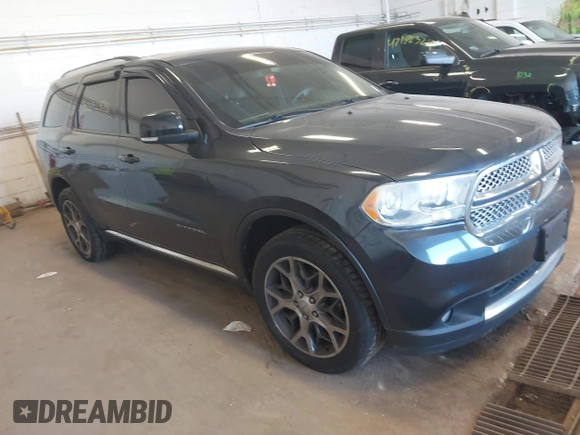 2013 Dodge Durango Citadel with VIN 1C4SDJET2DC529573, listed as a IAAI auction lot 42192878 with 217,445 mi miles and . Bid and sale history available at DreamBid. Image 1.