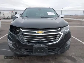 2021 Chevrolet Equinox Premier z VIN 2GNAXXEV4M6118442, wystawiony jako IAAI lot #41392148 z przebiegiem 92 170 mil mil oraz . Historia ofert i sprzedaży dostępna na DreamBid. Obrazek 13.