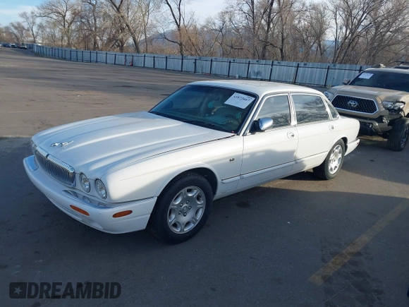 1998 Jaguar XJ Vanden Plas with VIN SAJKX6241WC829353, listed as a IAAI auction lot 41872667 with Not Provided miles and . Bid and sale history available at DreamBid. Image 2.
