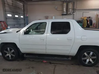 2014 Honda Ridgeline SE with VIN 5FPYK1F6XEB010582, listed as a IAAI auction lot 41641803 with 69,923 mi miles. Bid and sale history available at carsss.com. Image 14.