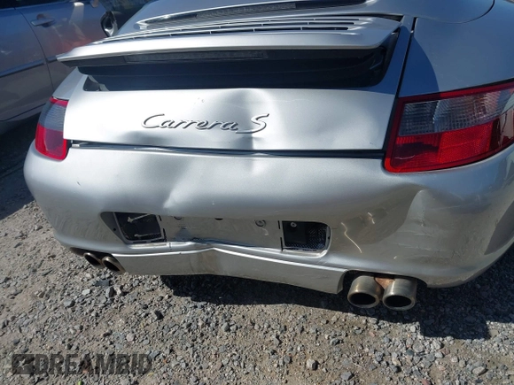 2006 Porsche 911 Carrera S z VIN WP0CB29976S766616, wystawiony jako IAAI lot #42119525 z przebiegiem 57 164 mil mil oraz . Historia ofert i sprzedaży dostępna na DreamBid. Obrazek 6.