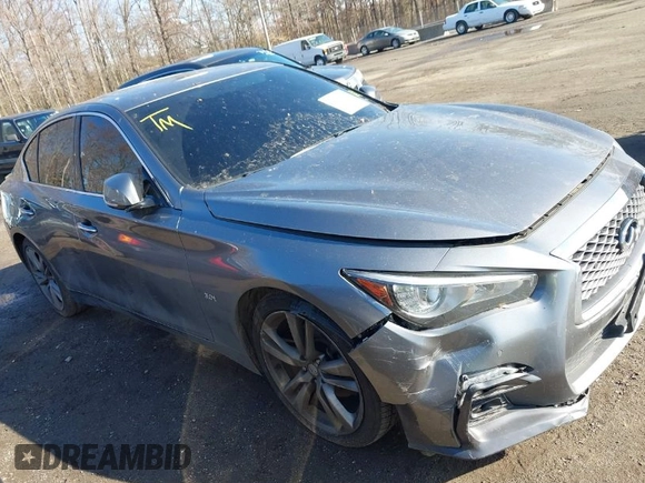 2019 Infiniti Q50 Luxe z VIN JN1EV7AR2KM590794, wystawiony jako IAAI lot #40841640 z przebiegiem 68 720 mil mil oraz . Historia ofert i sprzedaży dostępna na DreamBid. Obrazek 1.