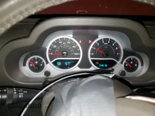 2007 Jeep Wrangler Sahara z VIN 1J4FA54127L132543, wystawiony jako Copart lot #55891995 z przebiegiem 74 616 mil mil oraz Szkoda całkowita • Salvage title. Historia ofert i sprzedaży dostępna na DreamBid. Obrazek 9.