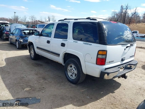 2005 Chevrolet Tahoe LS with VIN 1GNEK13T65J198121, listed as a IAAI auction lot 41826459 with 233,718 mi miles. Bid and sale history available at carsss.com. Image 3.
