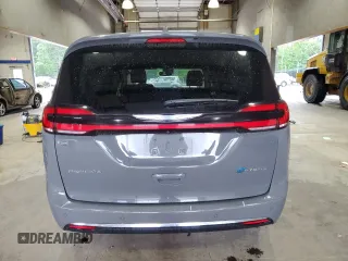 2021 Chrysler Pacifica Hybrid Touring L with VIN 2C4RC1L72MR596429, listed as a Copart auction lot 53859345 with 97,218 mi miles and Salvage title. Bid and sale history available at DreamBid. Image 6.