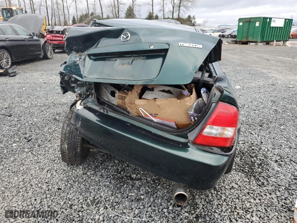 2003 Mazda Protege DX with VIN JM1BJ226431166152, listed as a Copart auction lot 85735024 with 0 mi miles and Salvage Title. Bid and sale history available at carsss.com. Image 6.