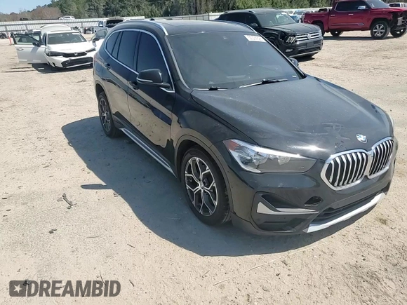 2021 BMW X1 xDrive28i z VIN WBXJG9C07M5S73464, wystawiony jako Copart lot #50374525 z przebiegiem 117 828 mil mil oraz Tytuł czysty. Historia ofert i sprzedaży dostępna na DreamBid. Obrazek 11.