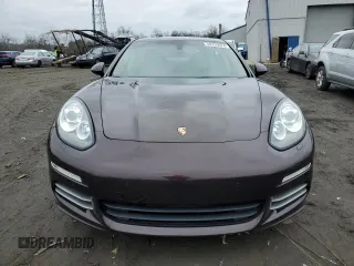 2015 Porsche Panamera 4 z VIN WP0AA2A7XFL001690, wystawiony jako Copart lot #40765024 z przebiegiem 86 770 mil mil oraz . Historia ofert i sprzedaży dostępna na DreamBid. Obrazek 5.