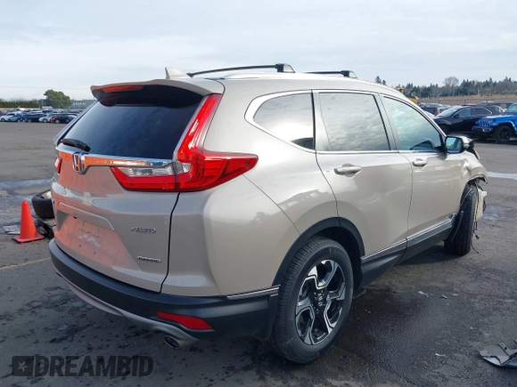 2017 Honda CR-V Touring with VIN 5J6RW2H99HL002127, listed as a IAAI auction lot 41517919 with 18,367 mi miles. Bid and sale history available at carsss.com. Image 4.