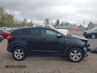 2012 Kia Sportage LX with VIN KNDPBCA27C7206731, listed as a IAAI auction lot 42056238 with 67,926 mi miles and . Bid and sale history available at DreamBid. Image 14.
