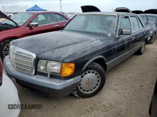 1989 Mercedes-Benz 560 with VIN WDBCA39E4KA455939, listed as a Copart auction lot 74931684 with 153,277 mi miles and Salvage Title. Bid and sale history available at DreamBid. Image 1.