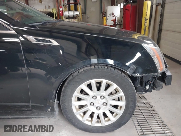 2011 Cadillac CTS Luxury with VIN 1G6DG5EYXB0145058, listed as a IAAI auction lot 41973156 with 143,246 mi miles and . Bid and sale history available at carsss.com. Image 13.