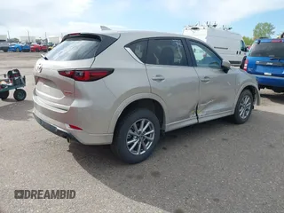 2025 Mazda CX-5 2.5 S Preferred Package with VIN JM3KFBCL1S0601601, listed as a IAAI auction lot 42135173 with 2,392 mi miles. Bid and sale history available at carsss.com. Image 4.