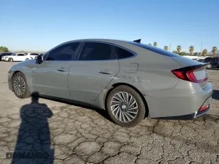 2021 Hyundai Sonata Hybrid SEL with VIN KMHL34JJ6MA032448, listed as a Copart auction lot 48497345 with 57,520 mi miles and Salvage Title. Bid and sale history available at carsss.com. Image 2.