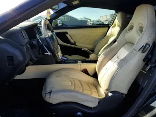 2015 Nissan GT-R Premium z VIN JN1AR5EFXFM280731, wystawiony jako Copart lot #77720934 z przebiegiem 96 483 mil mil oraz Szkoda całkowita • Salvage title. Historia ofert i sprzedaży dostępna na DreamBid. Obrazek 7.