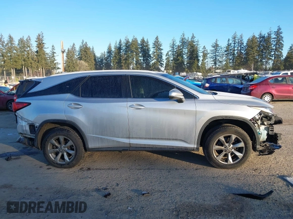 2018 Lexus RX 350L Premium z VIN JTJDZKCAXJ2008164, wystawiony jako IAAI lot #41436168 z przebiegiem 126 798 mil mil oraz . Historia ofert i sprzedaży dostępna na DreamBid. Obrazek 14.