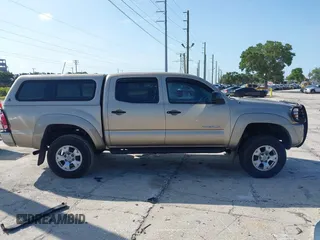 2007 Toyota Tacoma PreRunner z VIN 3TMJU62N87M040287, wystawiony jako IAAI lot #42375199 z przebiegiem 403 876 mil mil oraz . Historia ofert i sprzedaży dostępna na DreamBid. Obrazek 13.
