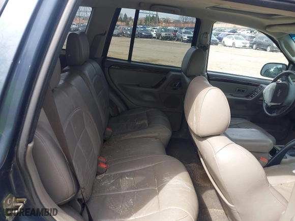 2004 Jeep Grand Cherokee Limited with VIN 1J8GW58N44C274714, listed as a IAAI auction lot 41922819 with 204,251 mi miles. Bid and sale history available at carsss.com. Image 8.